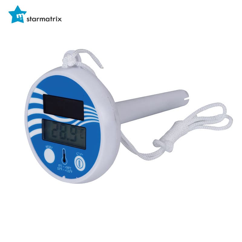 Floating digital thermometer with LCD readout and tether cord
